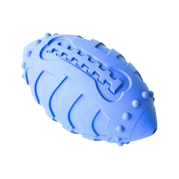 Light green thickened rubber rugby ball dog toy with textured surface for teeth cleaning.
