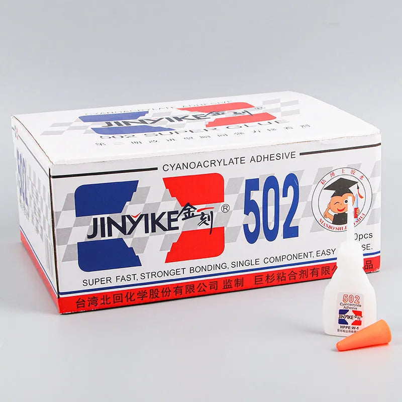 Tube of specialised shoe repair glue for strong, permanent adhesive patches on footwear.