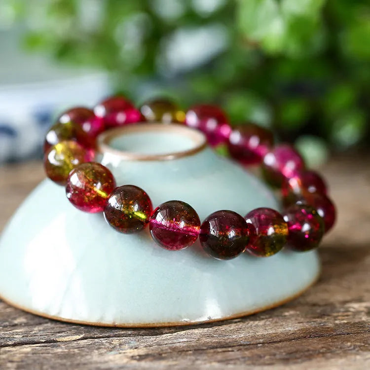 Women's watermelon crystal bracelet showing four size options from 6mm to 12mm diameter