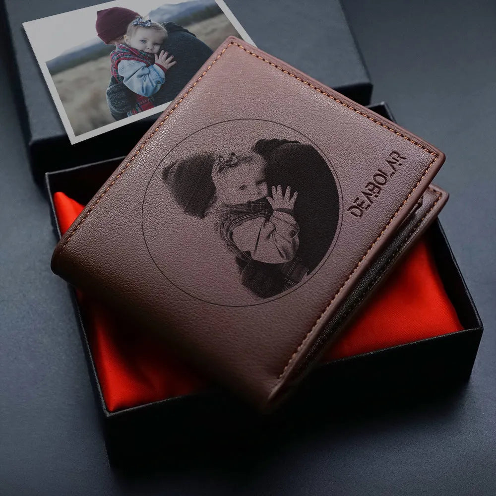 Leather men's wallet with zip closure, shown individually packaged.