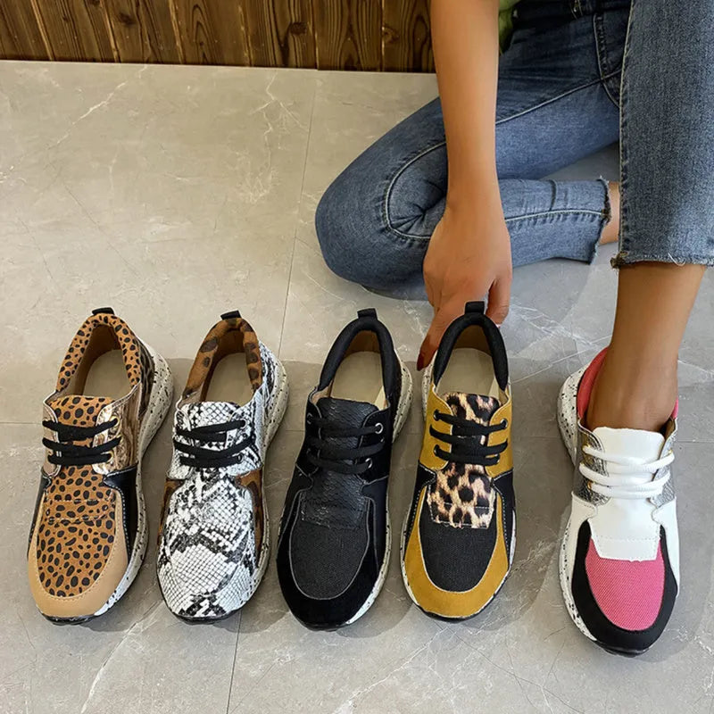 Women's wedge heel flat sneakers in breathable fabric showing round toe and slip-on design