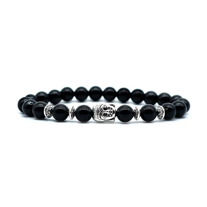 Unisex adjustable bracelet with a 19mm Buddha head charm in tiger eye stone.