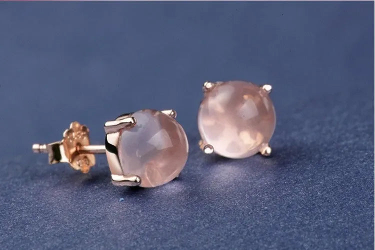 Women's rose gold Korean style drop shaped stud earrings with synthetic ross quartz crystal inlay