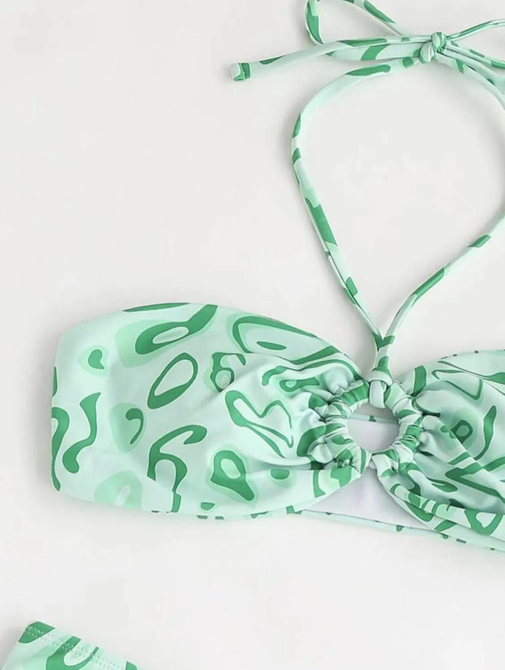 Blue floral bandeau bikini with split design and matching briefs