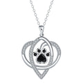 Copper pendant necklace with dogs and cats paw print design on cross chain