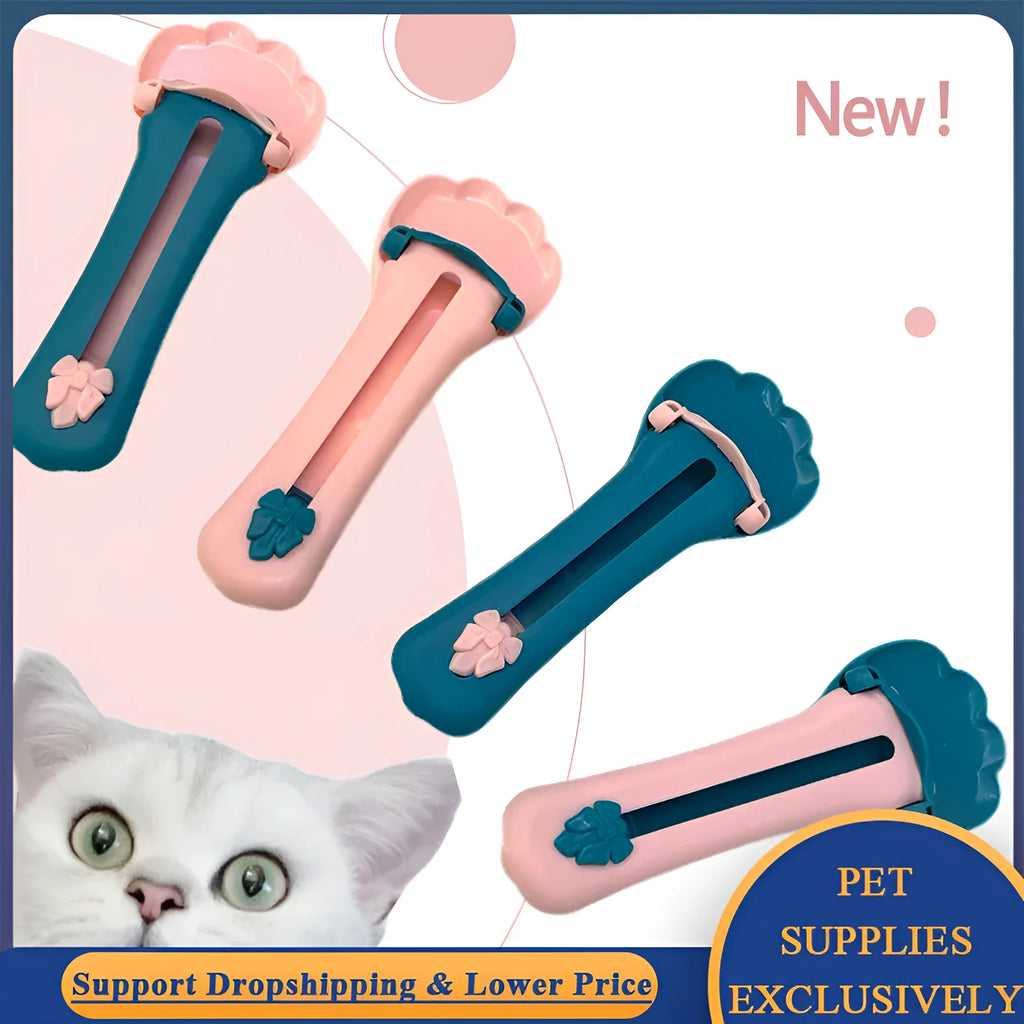 Green and pink plastic pet feed spoon with squeezer dispenser for liquid food and treats
