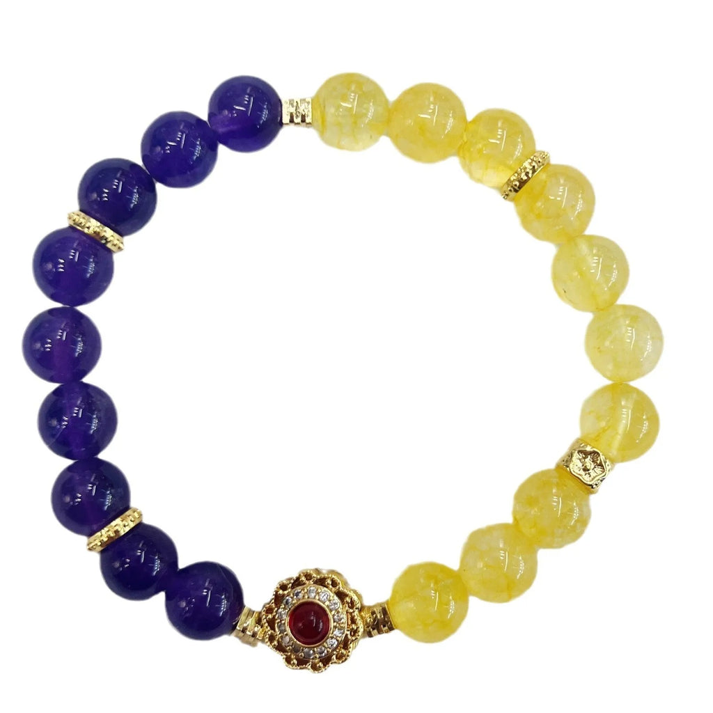Handmade women's yellow and purple amethyst crystal bracelet showing manual craftsmanship details