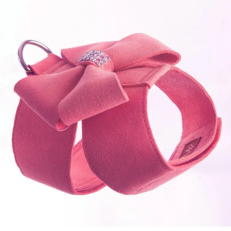 Dog harness with bowknot design in microfiber material showing pink, blue and orange colour options