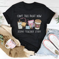 Black straight fit cotton short sleeve t-shirt with round neck on a hanger