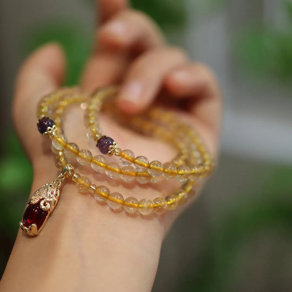 Natural Brazil gold rutilated quartz bracelet with three circles design and Chinese style