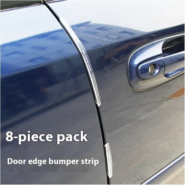 White plastic car door edge protector strip on a vehicle door.