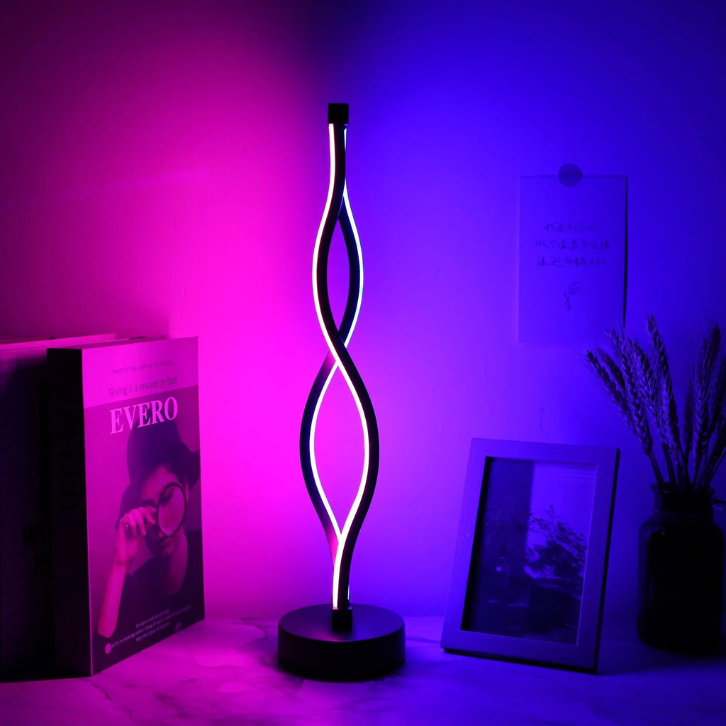 Black aluminium desk lamp with touch dimming button showing three colour temperature settings