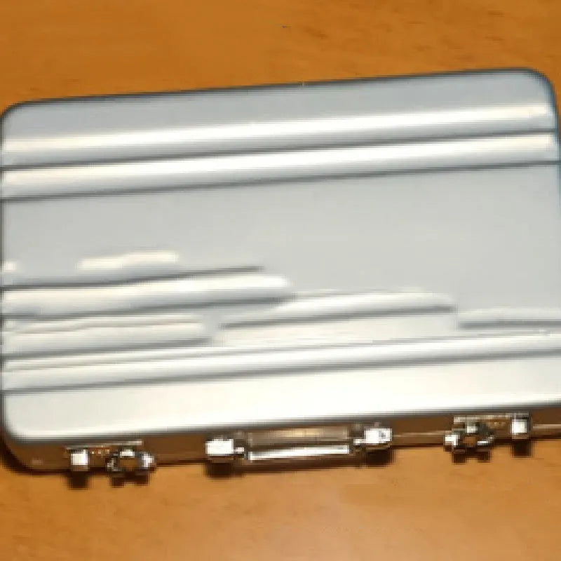 Aluminium alloy metal card holder in six colour options showing compact size.