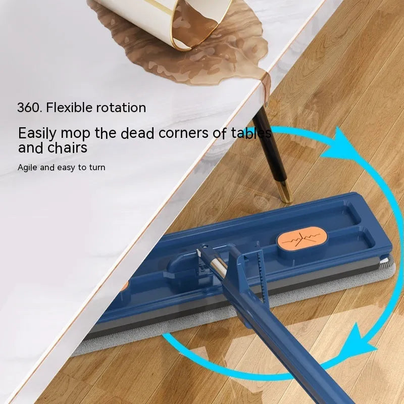 Large flat mop with a long stainless steel handle and a blue microfiber cloth on a hard floor.