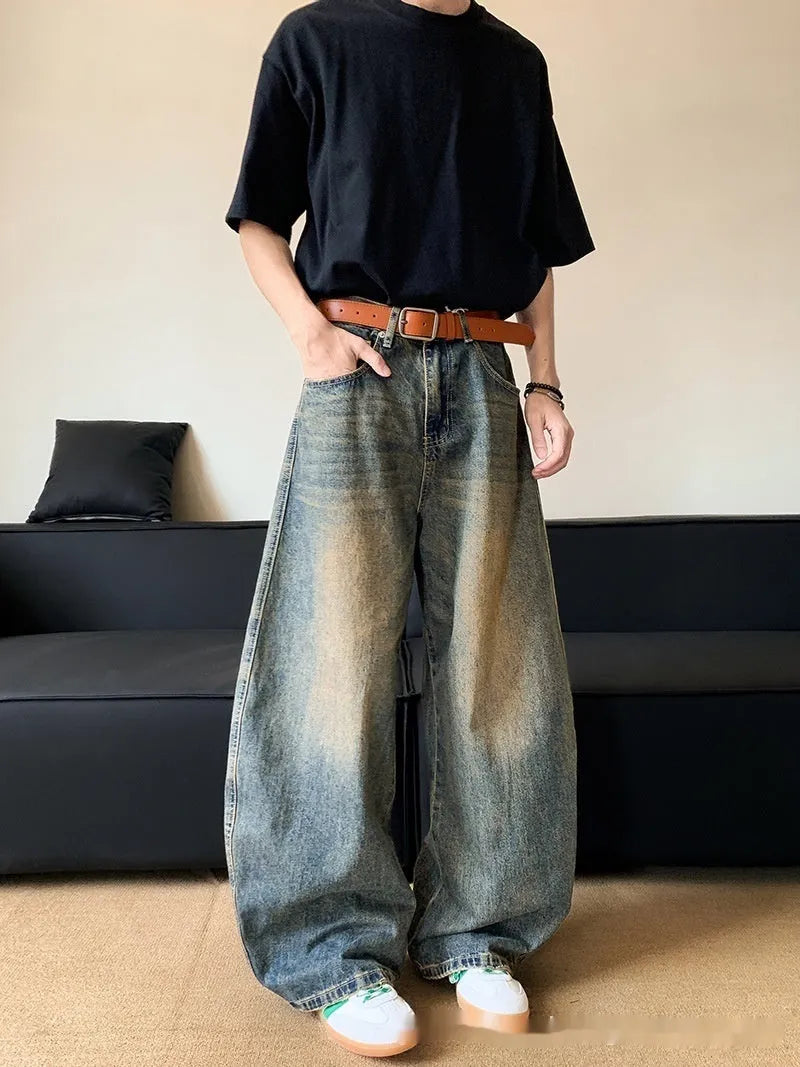 Men's retro blue distressed denim jeans with wide-leg cut and micro elasticity fabric