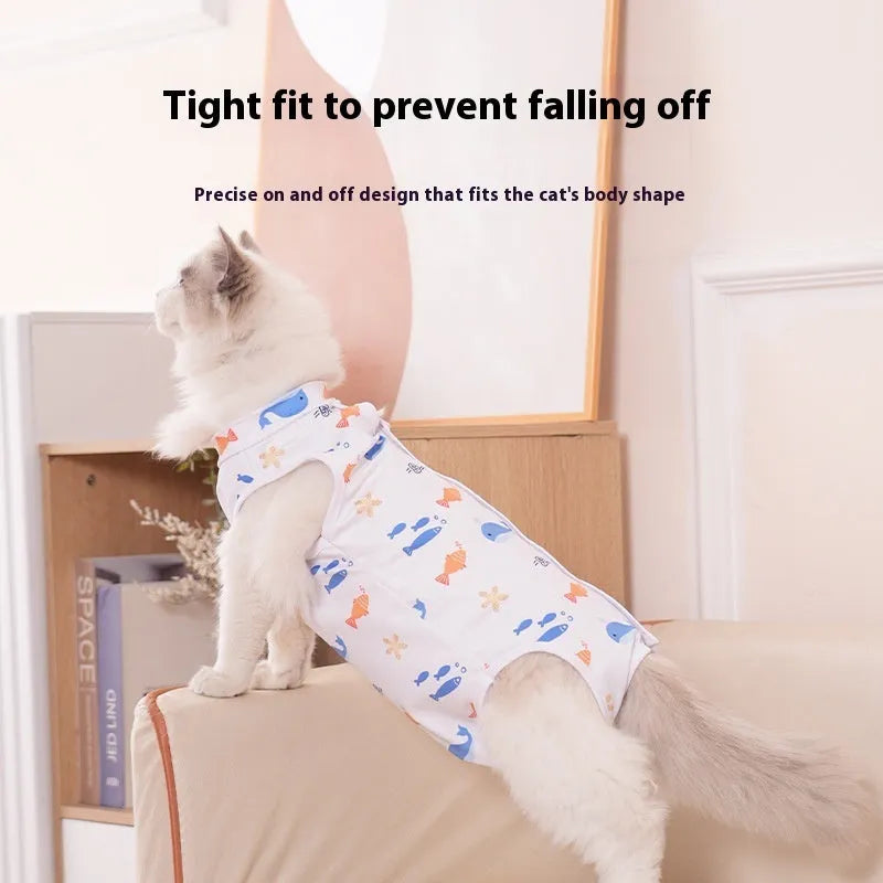 Cat wearing a printed post-operation recovery suit with velcro fastenings on its back.