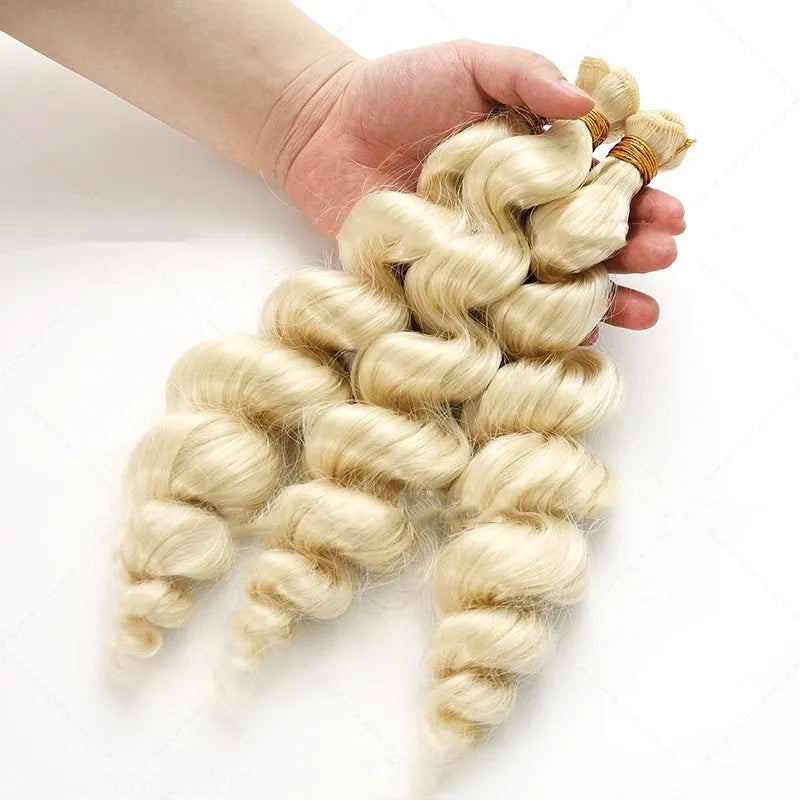 Golden synthetic wig for women on a stand, showing long, straight hair in a bright gold colour.