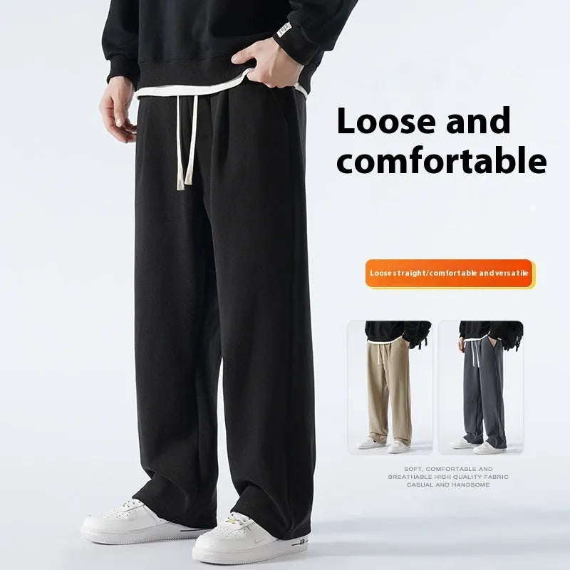 Men's apricot coloured loose-fit polar fleece trousers with a thick lining and drawstring waist.