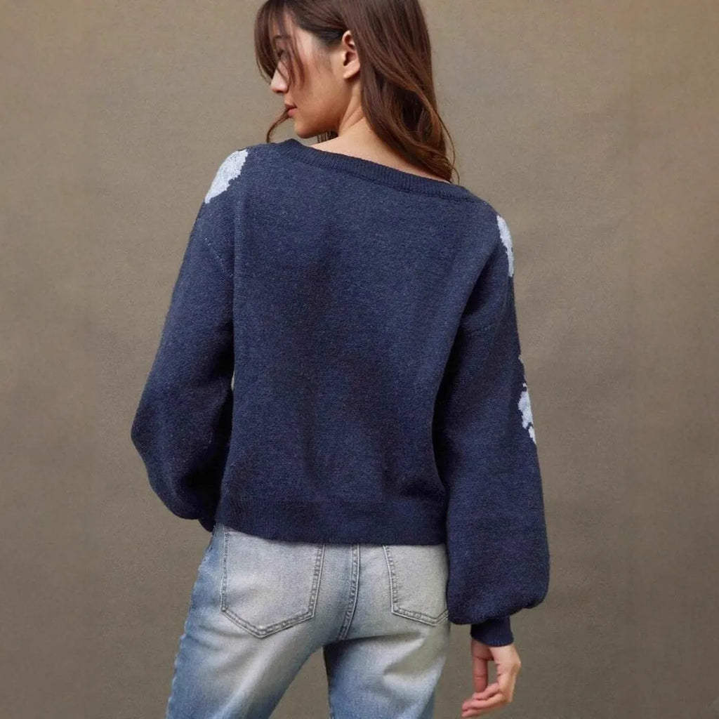 Sapphire blue women's pullover with floral jacquard pattern, off-neck collar, and loose fit