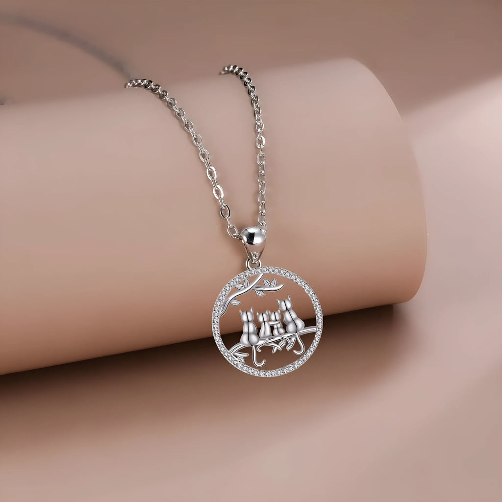 Four Kitten Necklace with cat motif pendant on cross chain