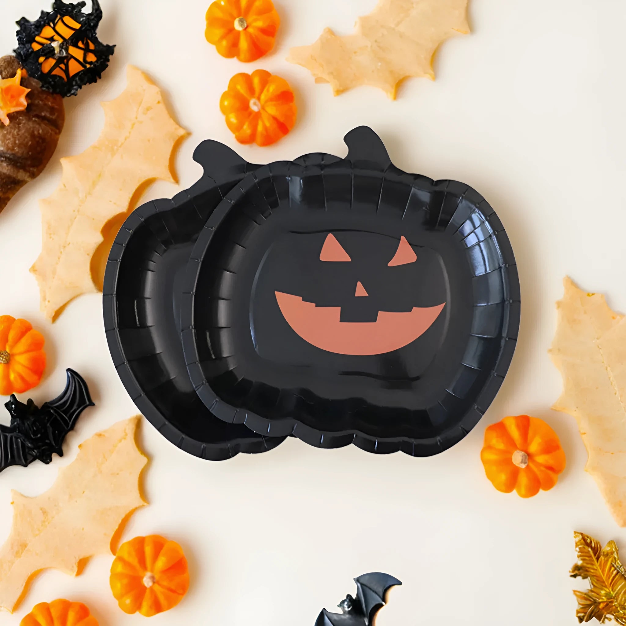 Black Halloween pumpkin design on 9-inch disposable paper plate