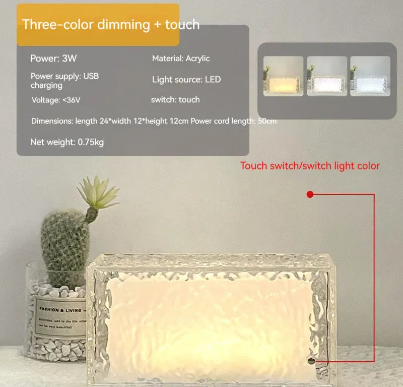 Geometric ice cube shaped clear acrylic LED night light on a table.