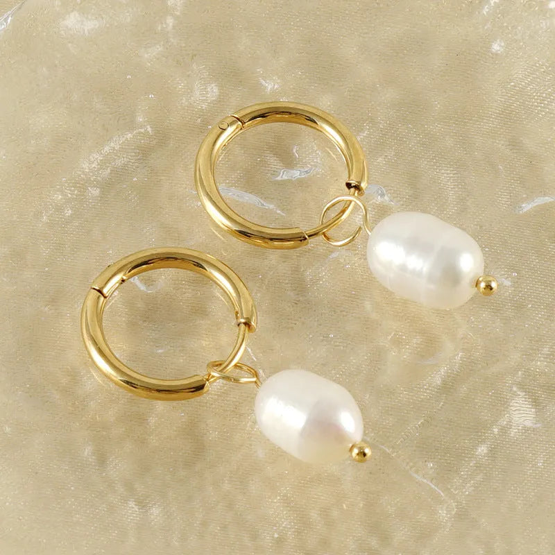 Geometric pearl earrings with gold electroplating on stainless steel and titanium steel construction