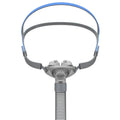 Nasal pillow ventilator mask with plastic plug, silicone cushion, and thickened headband