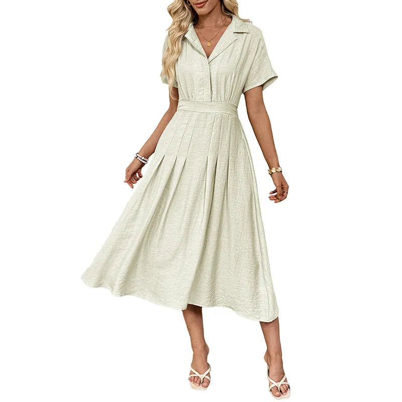 Light green women's twill shirt dress with lapel collar, fitted waist, and a chest pocket.