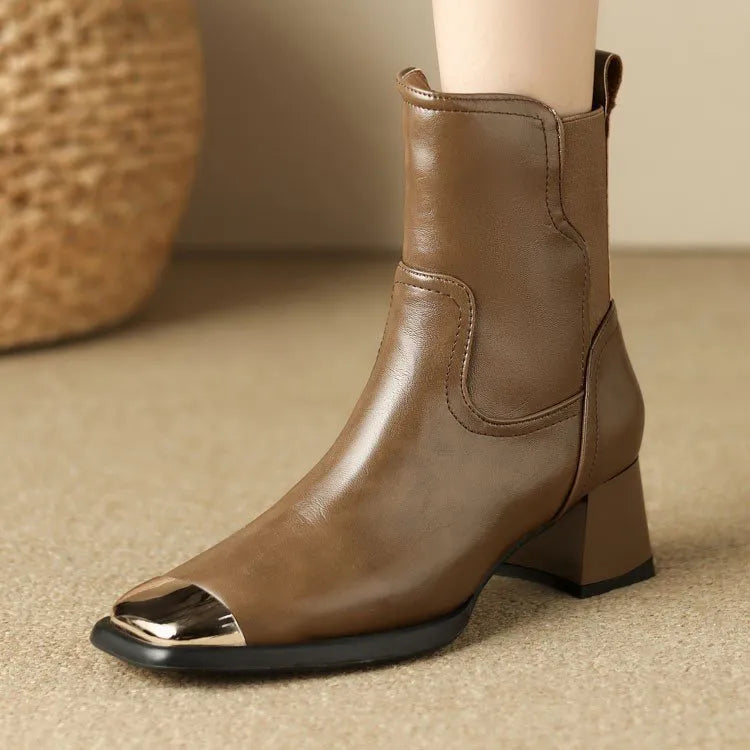 Brown women's high-heel Martin boots with a side zipper and cowhide leather upper.