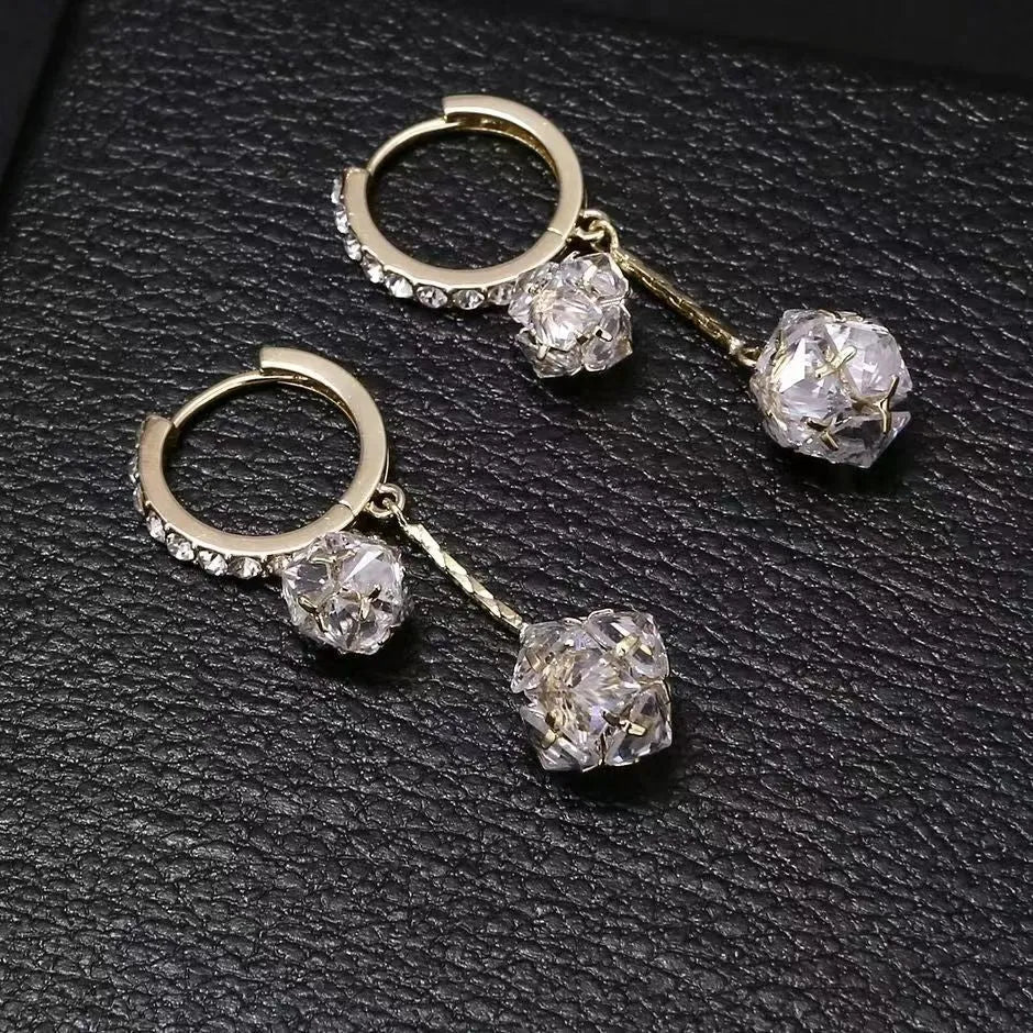 Women's silver drop earrings with tassel ball and rhinestone ball double pendant design, clip-on fastening