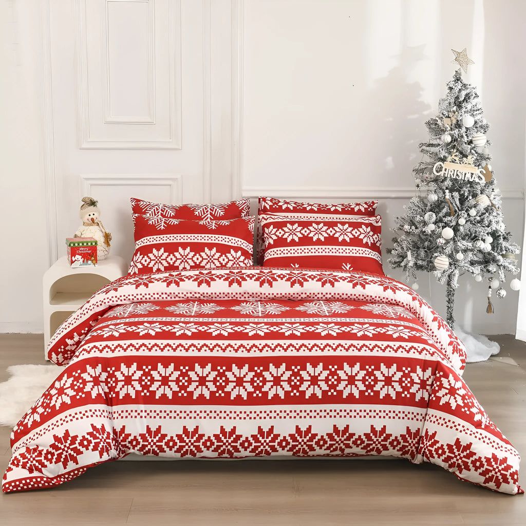 Red Winter Sleepers quilt cover and pillowcases with Christmas Love Song pattern on a bed.