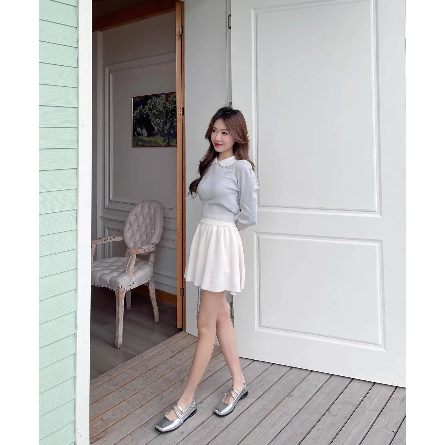 Women's silver genuine leather Mary Jane ballet flats with a cross buckle strap and flat heel.