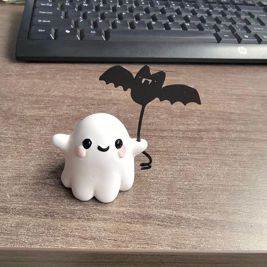 Small resin ghost walking dog Halloween statue in ghost holding bat colour