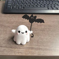 Small resin ghost walking dog Halloween statue in ghost holding bat colour