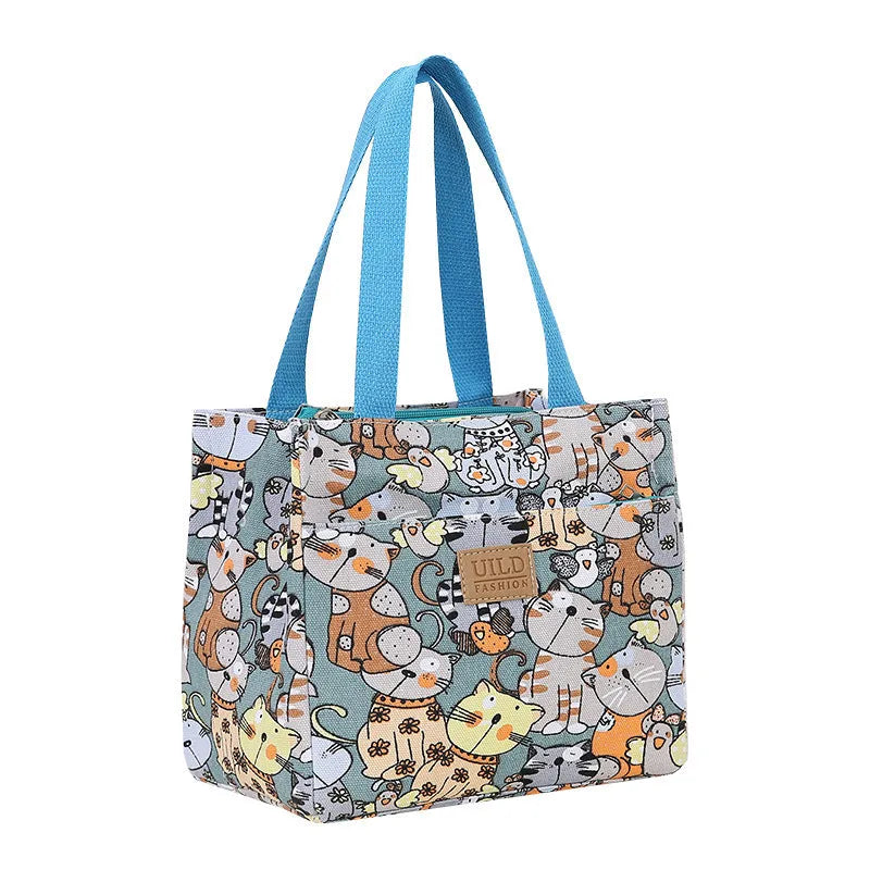 Women's printed canvas handbag with large capacity and multiple colour pattern options