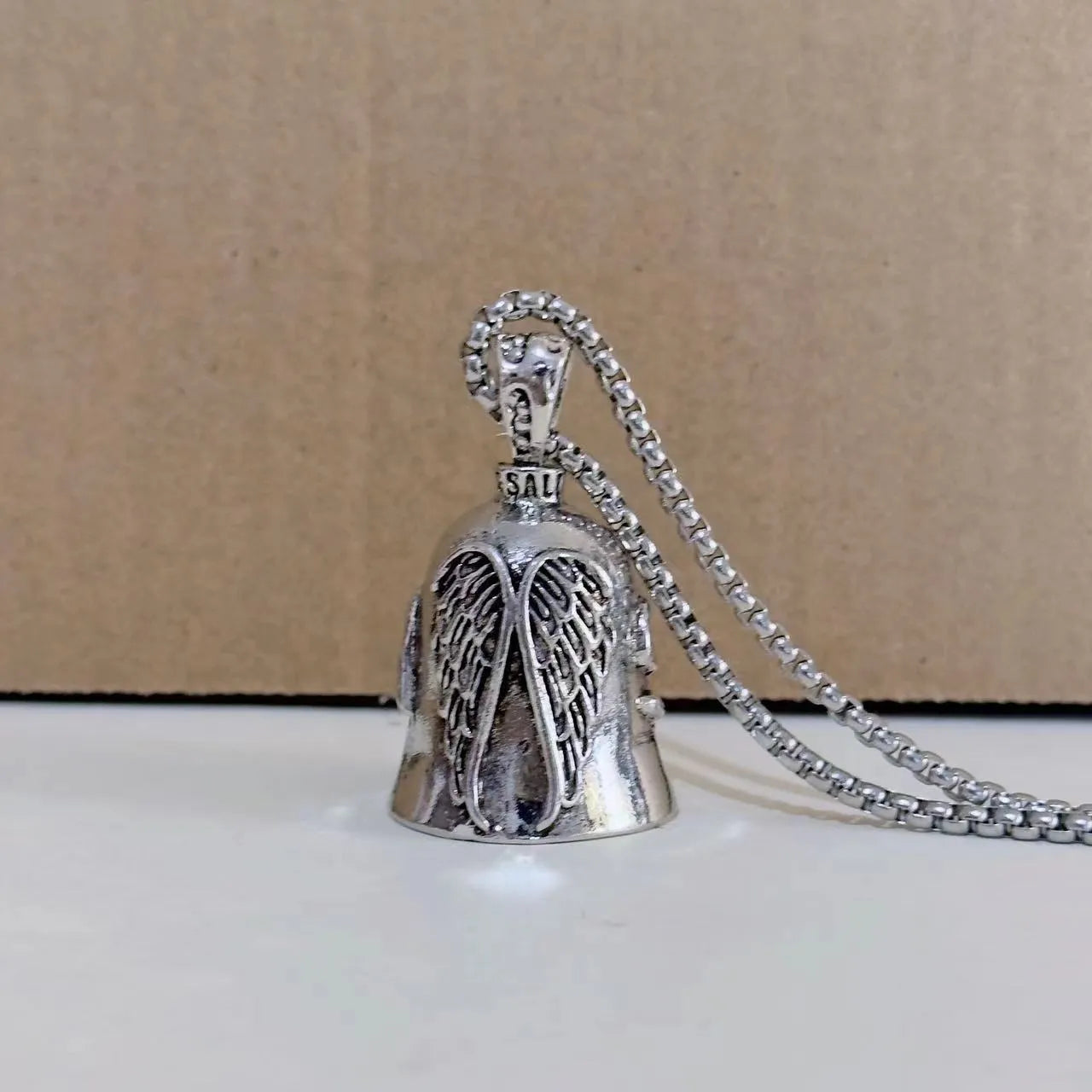 Vintage white angel feather necklace and matching keychain made from alloy metal.