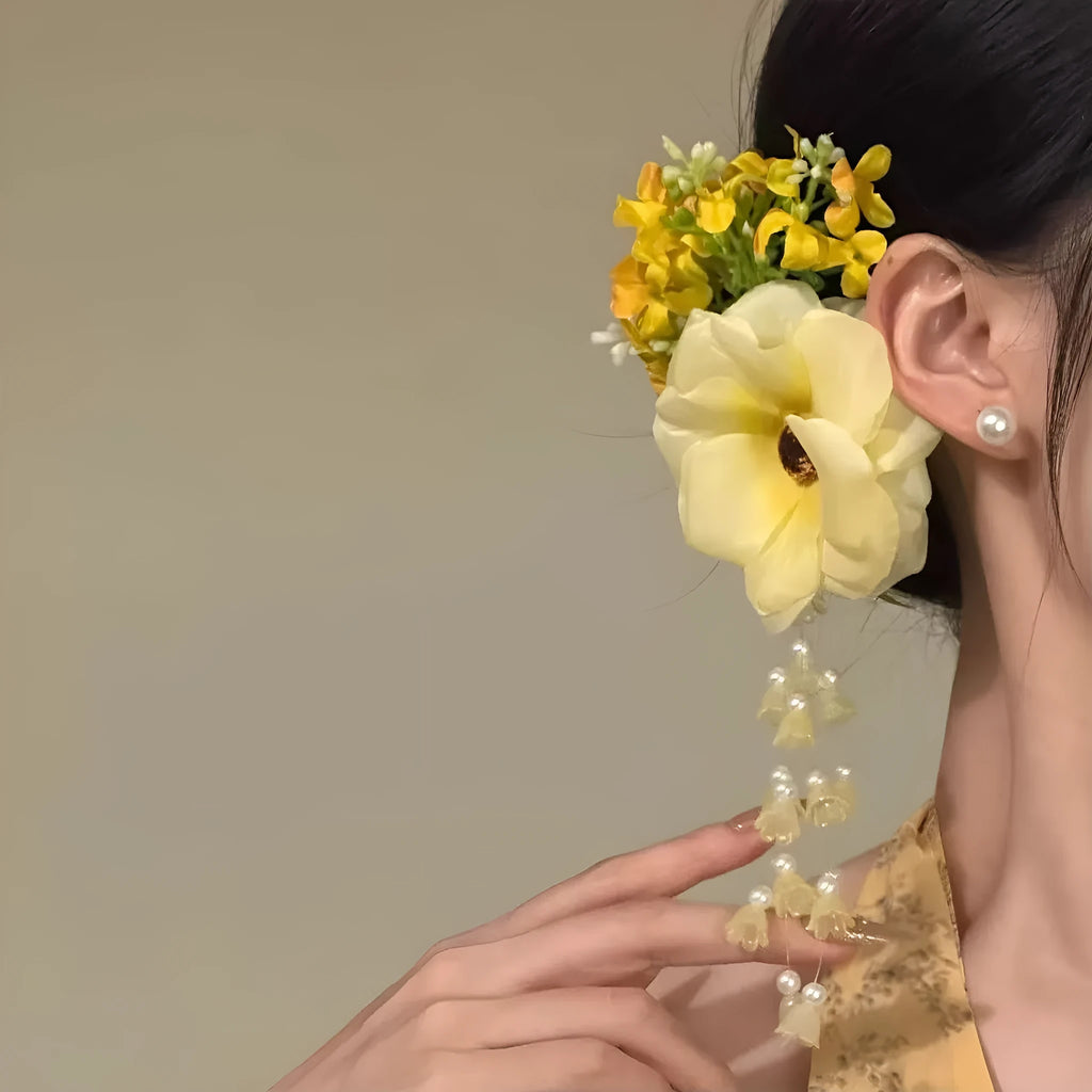 Women's floral tassel side hair clip in purple or yellow with mixed materials