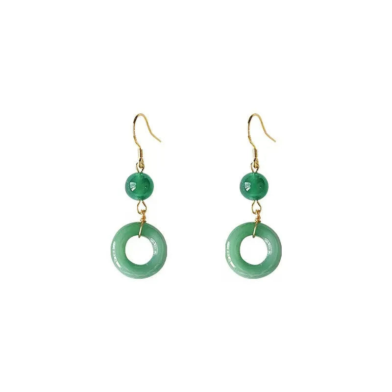 Green and gold Chinese style peace buckle shape earrings with geometric ring design.