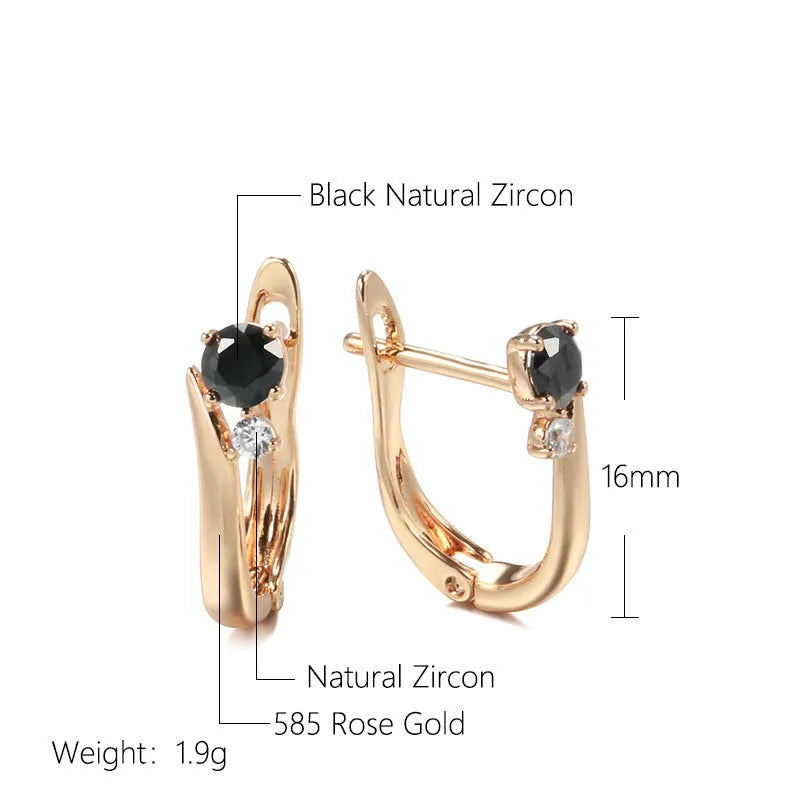 Gold geometric drop earrings with black agate stone styling