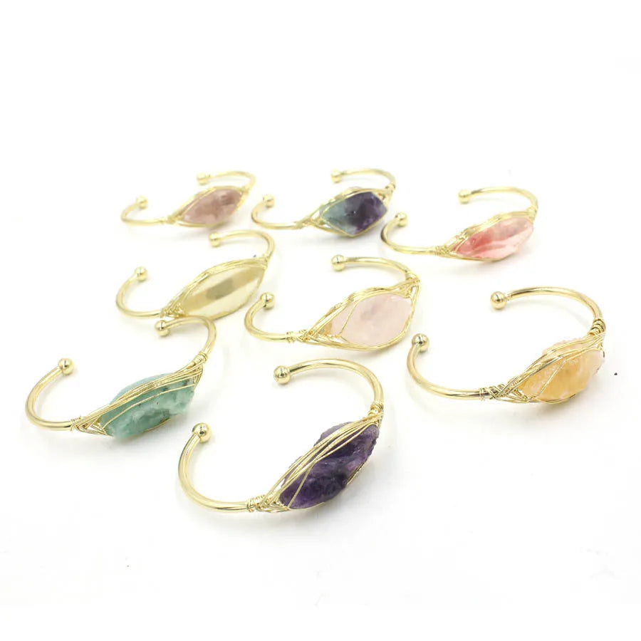 Natural raw gemstone crystal bracelet showing 8mm winding design with simple opening clasp in amethyst colour