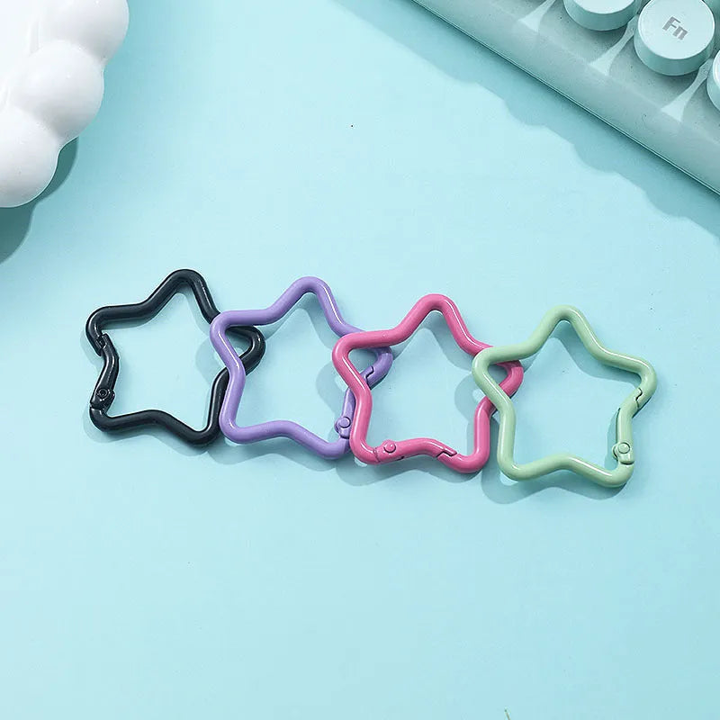 Zinc alloy five-pointed star keychain in a choice of macaron colours on a split ring.