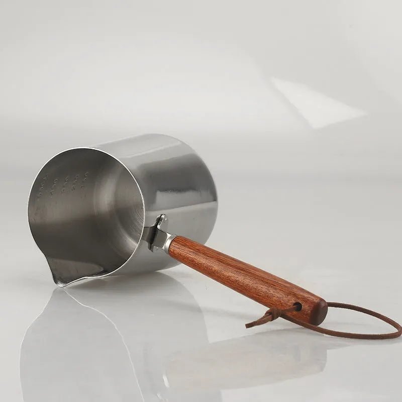 Stainless steel garland pattern coffee cup with a wooden handle in a simple modern style.