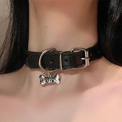 Black leather pet collar with small bell pendant for cats and small dogs
