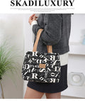 Women's printed canvas handbag with large capacity and multiple colour pattern options