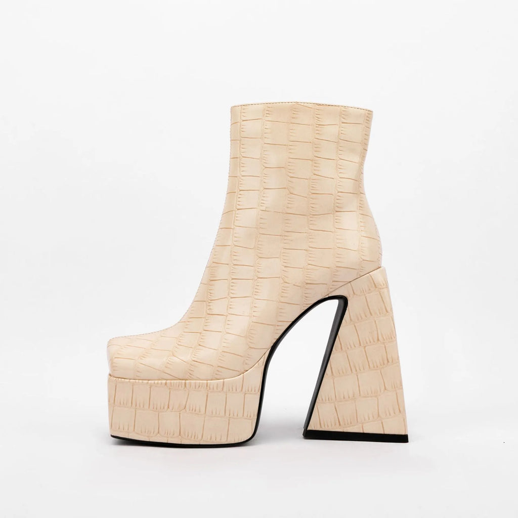 Women's artificial PU ankle boots with super high heels, shown in solid colours.