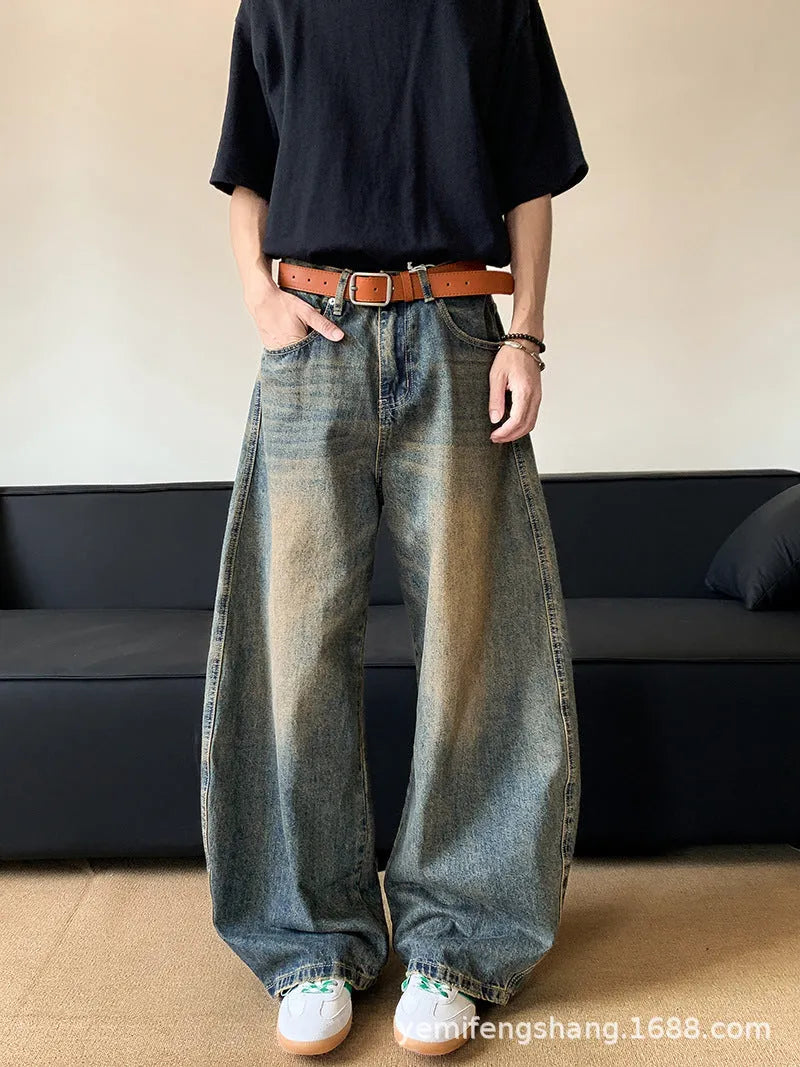 Men's retro blue distressed denim jeans with wide-leg cut and micro elasticity fabric