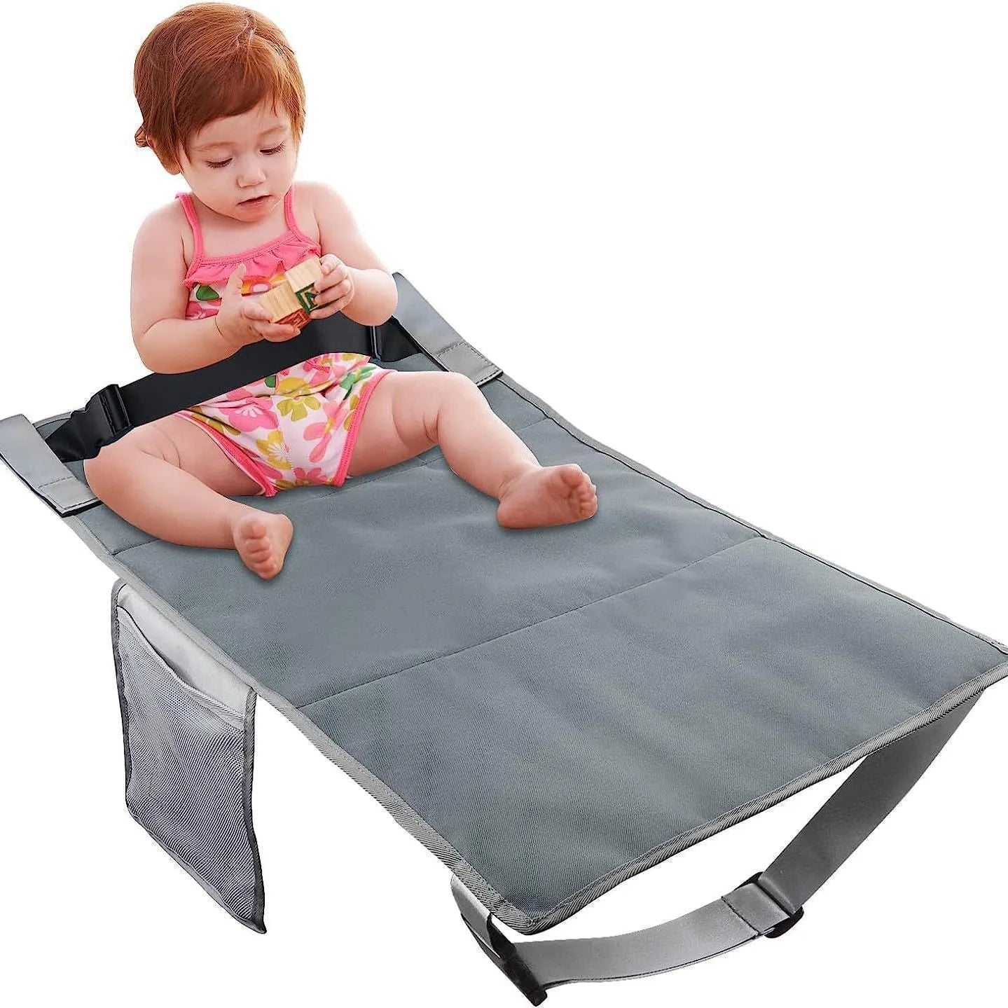 Blue portable children's aircraft pedal seat extender with extension device on cabin floor