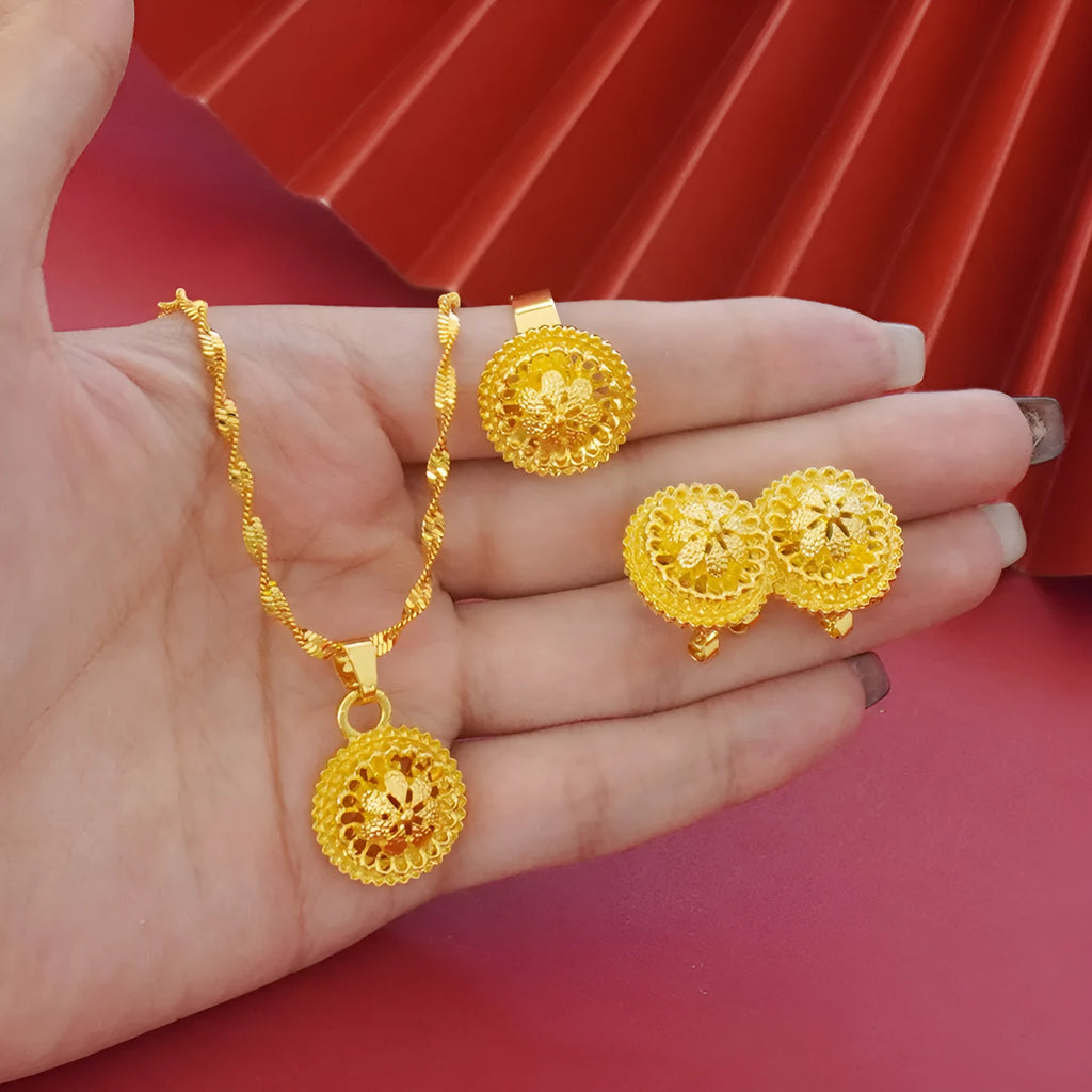 Gold electroplated three-piece jewellery set with floral designs, water wave chain necklace, matching earrings and ring