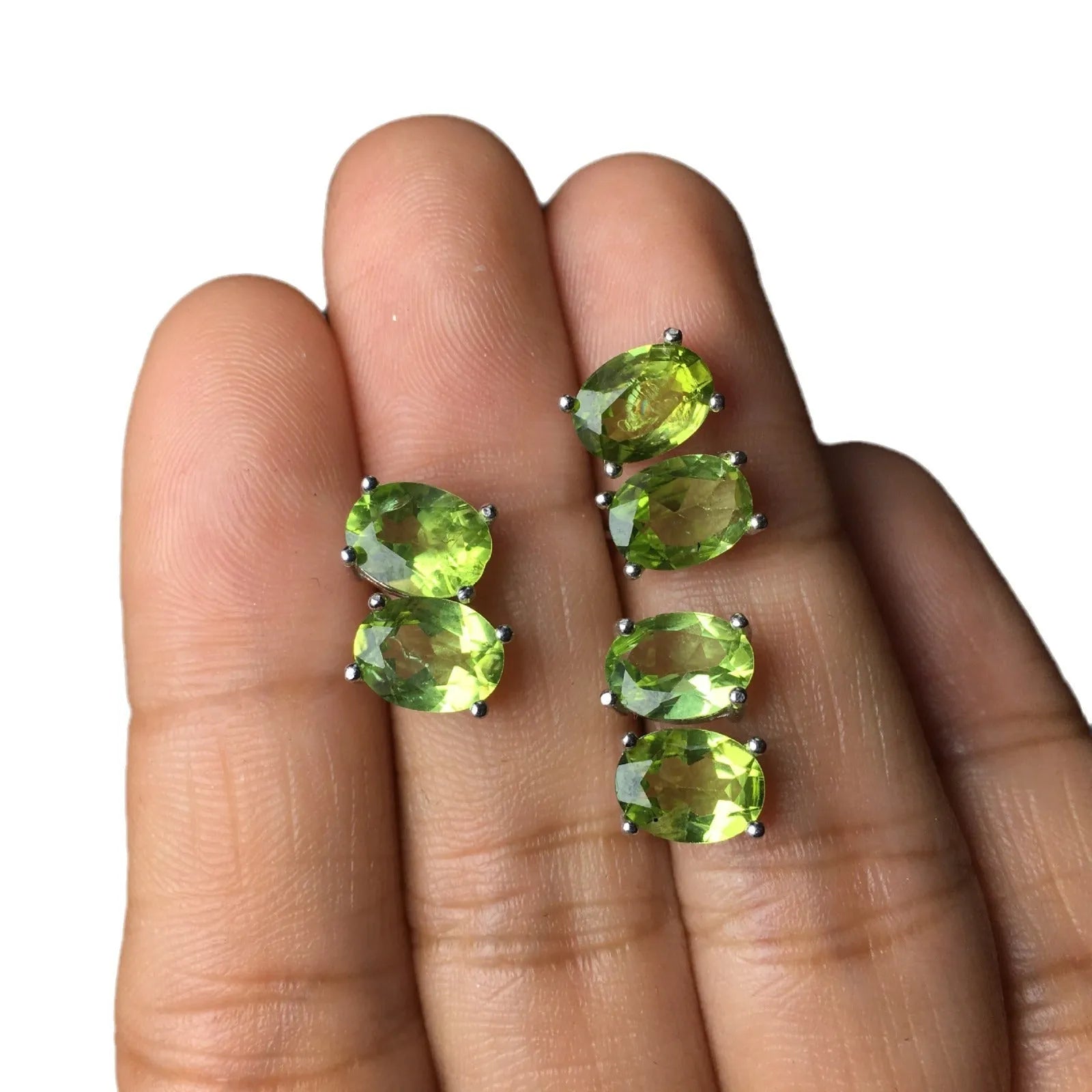 Grass green olivine stud earrings with S925 silver setting and geometric oval stone.